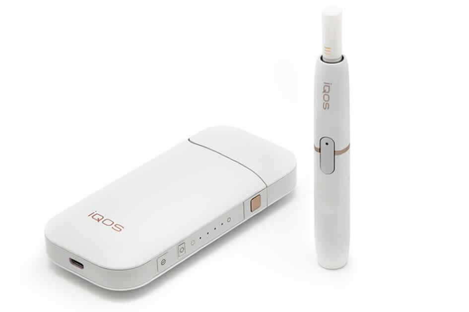 Philip Morris Internationalin sarj cihazi ve tutun cubuguyla birlikte sunulan IQOS elektronik sigara